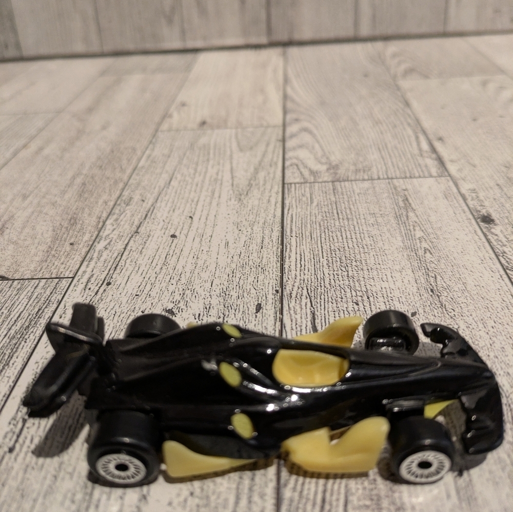 Hot Wheels Black and Yellow Formula Racer Toy Car for Kids
